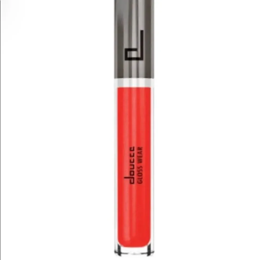 New in box Doucce Gloss wear shiny lip gloss in Color 770 dark coral